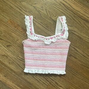 LoveShackFancy medium white smocked top with pink and red accents/cherries